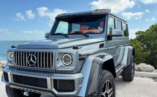 Mercedes-Benz G63 AMG luxury SUV rental parked near the waterfront available at Dream Exotics Miami
